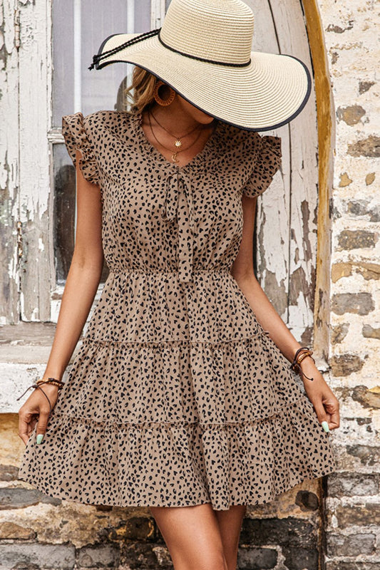 Wild Elegance Leopard Tiered Dress with Butterfly Sleeves.